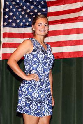 Alea-Makings-models-her-blue-and-white-romper-in-the-buymanship-division