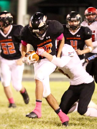 Brock Skelton gets loose for an Indian first down..jpg