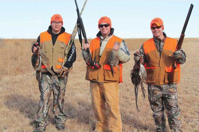 three-guys-with-roosters.gif