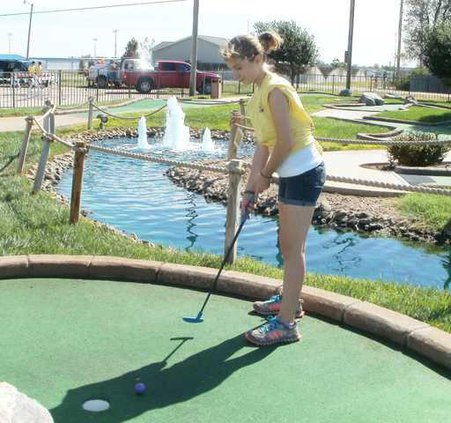 new kl girl golfing