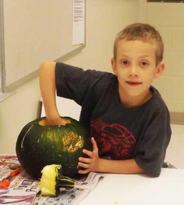 hoi kl boy with green pumpkin