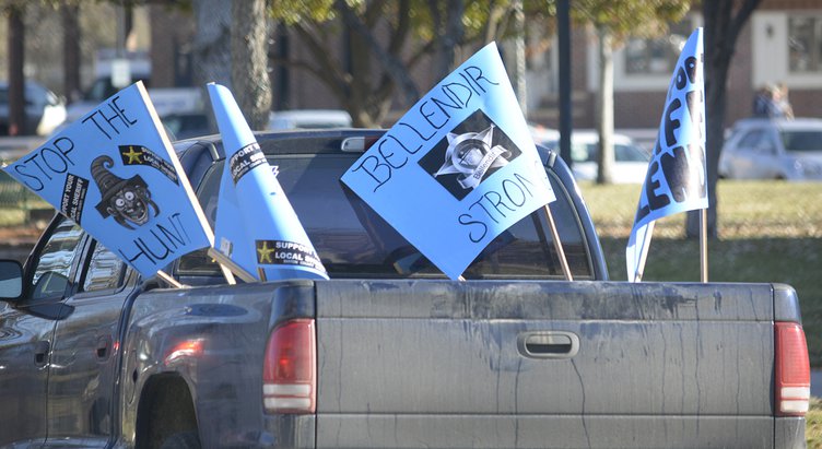 new_deh_bellendir news conference signs.jpg