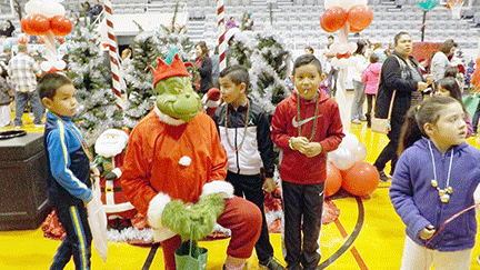 new_slt_santas workshop grinch w kids.tif