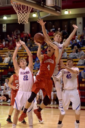 DSC_0058_1_Hoisington Mason Haxton (4) drives up the goal and scores witha lay up.jpg