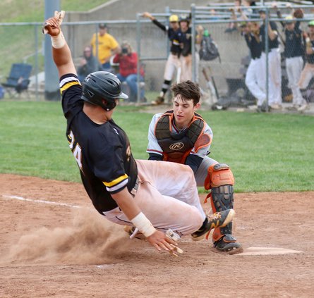 Jack Stelter makes contact for a single in game two of the double header..jpeg