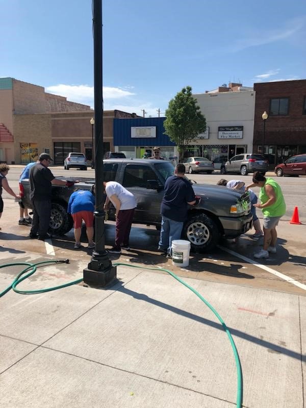 Sunflower Diversified raises money, awareness during Car Wash GREAT