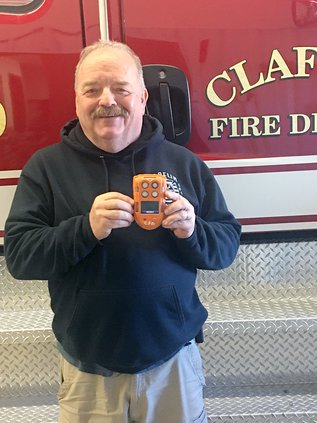 biz_vlc_Claflin fire chief with gas monitor.jpg