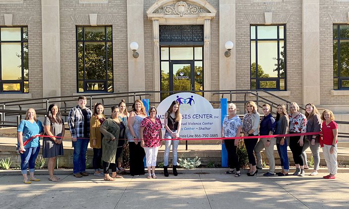 family crisis ribbon cutting