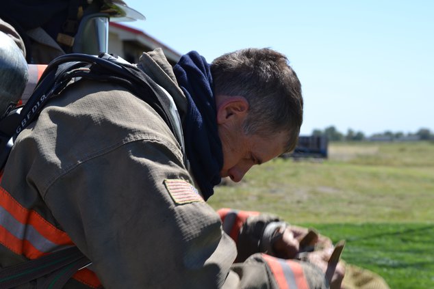 Pohlman puts on gear