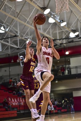 Drew Nicholson dribbles to the basket.and scores.jpg