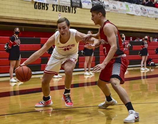 Cal Dunekack dribbles to the basket.jpg
