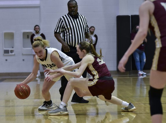 cBrynna Hammeke dribbles at the half-court against St. Paul.jpg