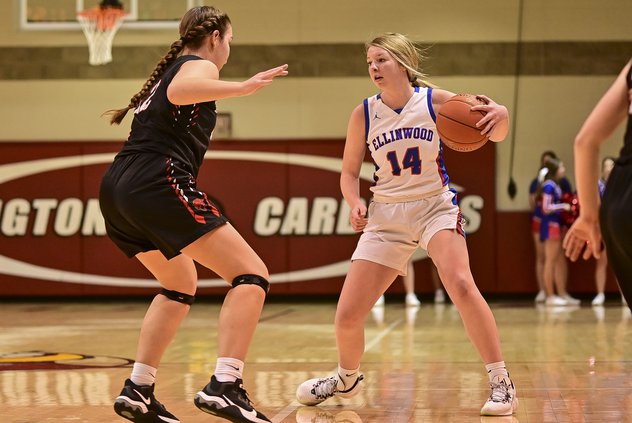 Ellinwood's Brittany Simpson looks to pass the basketball.jpg