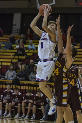 Ellinwood's Britton Dutton (0) scores against Victoria.jpg