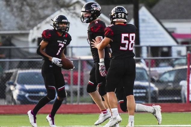 spt_hg_Great Bend wide receiver Braylon Council scores a touch down and celebrates with teammates.jpg