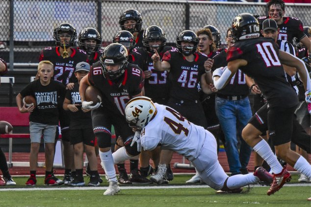 Cody Miller rushes the football.jpg
