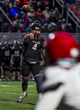 Cayden Scheuerman throws a complete pass to Cody Miller .jpg