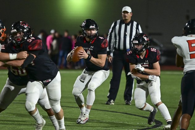 Cayden Scheuerman looks to throw a complete pass.jpg