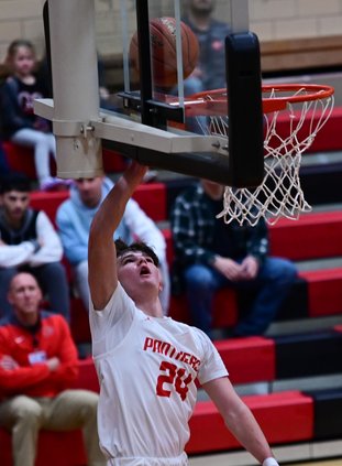 Carter Coombs scores a layup against Hays.jpg