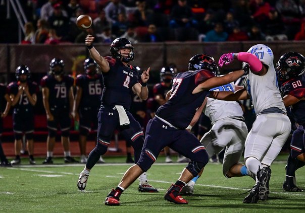 Cayden Scheuerman Throws a complete pass.jpg