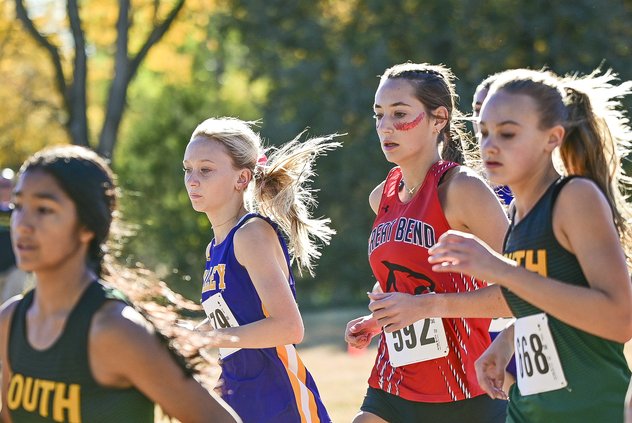 Addy Nicholson competes in the 2023 5A cross country race.jpg