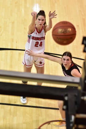 Hoisington's Kylee Hahn scores the winning shot against Ellsworth.jpg