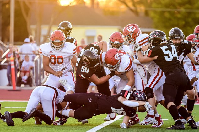 Cody Miller dives in to gain extra yardage.jpg