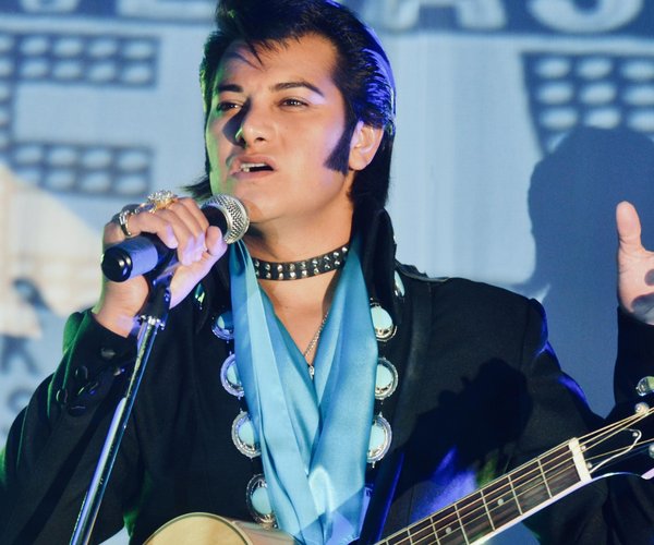 Joseph Hall as Elvis Presley