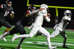 Great Bend MLB Kale Kern makes an important tackle on Ethan Gomez .jpg