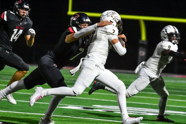 Great Bend MLB Kale Kern makes an important tackle on Ethan Gomez .jpg