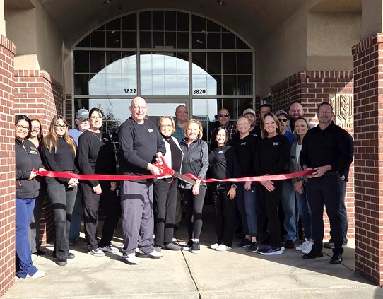 Larry Kutina ribbon cutting 2025