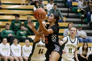 Lauren Sleder drives the lane