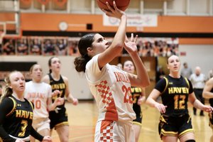 lauren sleder drives the lane