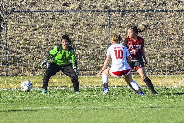 spt_hg_Grecia Dominguez defends the goal and stops a shot at goal.jpg
