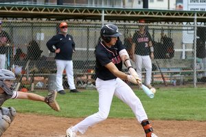 Tristan Regan clears the bases